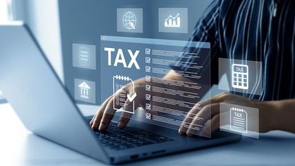 Laptop featuring a transparent digital tax display