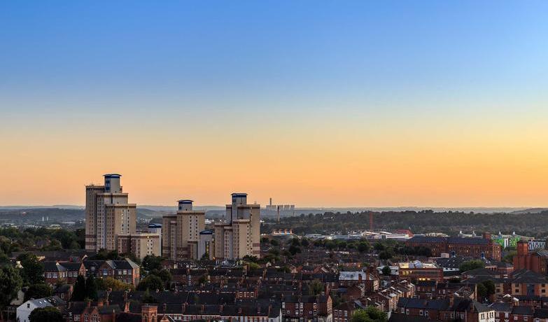 Radford flats tower block with power station behind in Nottingham