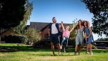 Family playing in garden