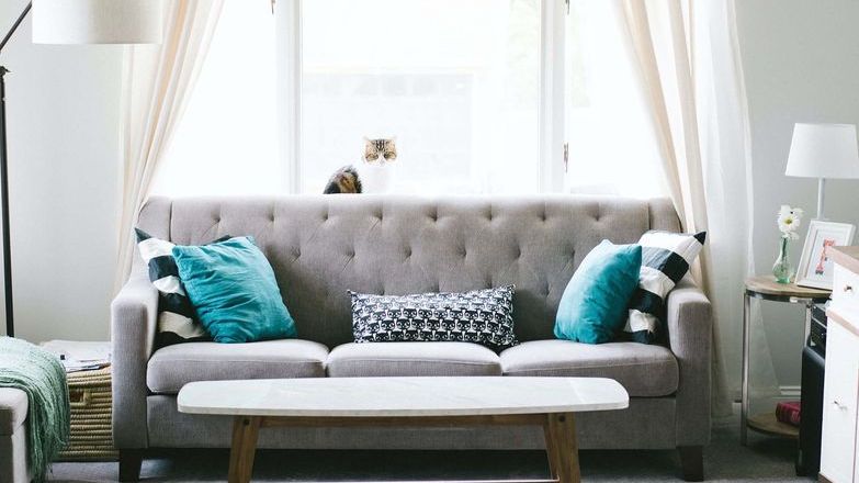 Grey sofa in well furnished property.jpg