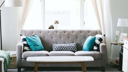 Grey sofa in well furnished property.jpg