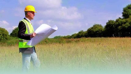 Builder holding plans