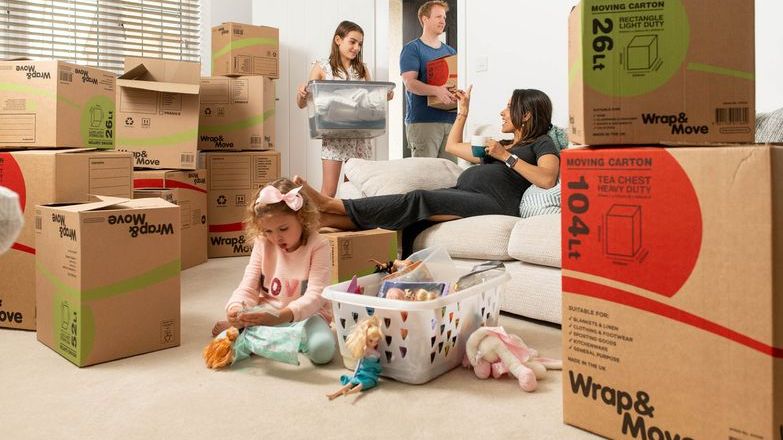 family with moving boxes