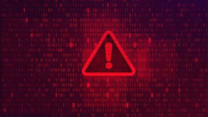 Red exclamation mark warning sign amongst binary code