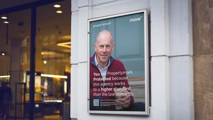 Phil Spencer Move iQ poster outside shop.jpg