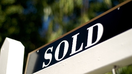 Black sold sign.jpg