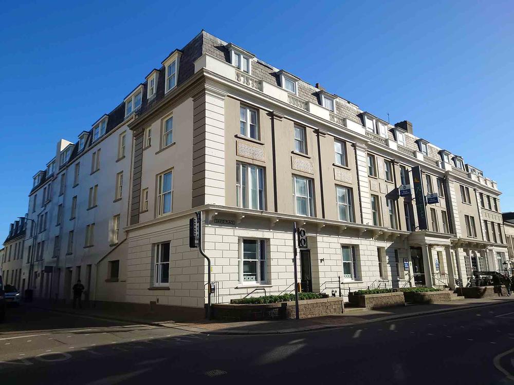 Outside view of The Best Western Royal Hotel in St Hellier, Jersey with blue sky background