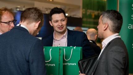 Delegates chatting by Propertymark branded bags at NAEA National Conference 2020.jpg