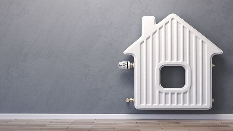 Home heating radiator in the form of house