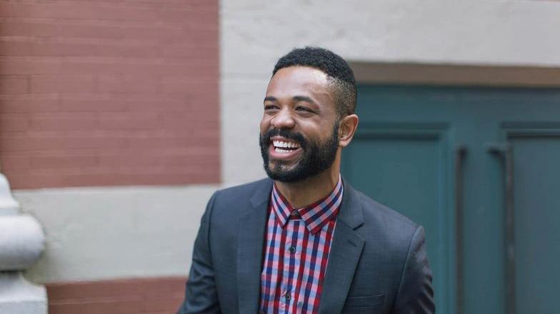 Smartly dressed smiling man