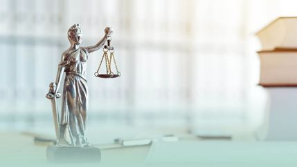 Lady justice figure in office