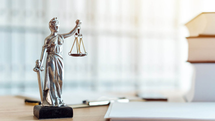 Lady justice figure in office
