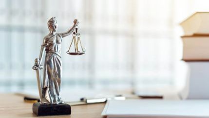 Lady justice figure in office.jpg