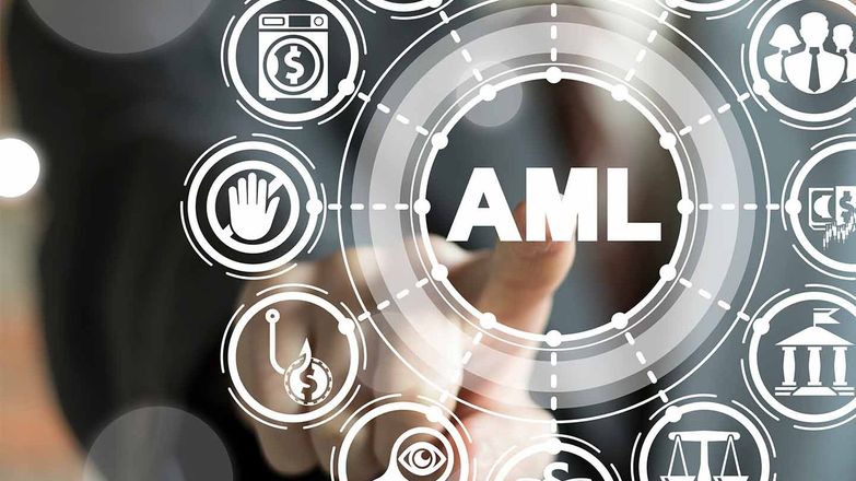 Man in suit pressing AML button graphic