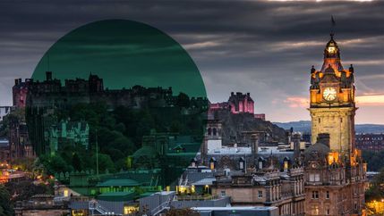 Edinburgh castle and cityscape illuminated at night