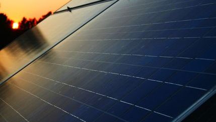 Solar panels on roof at dusk