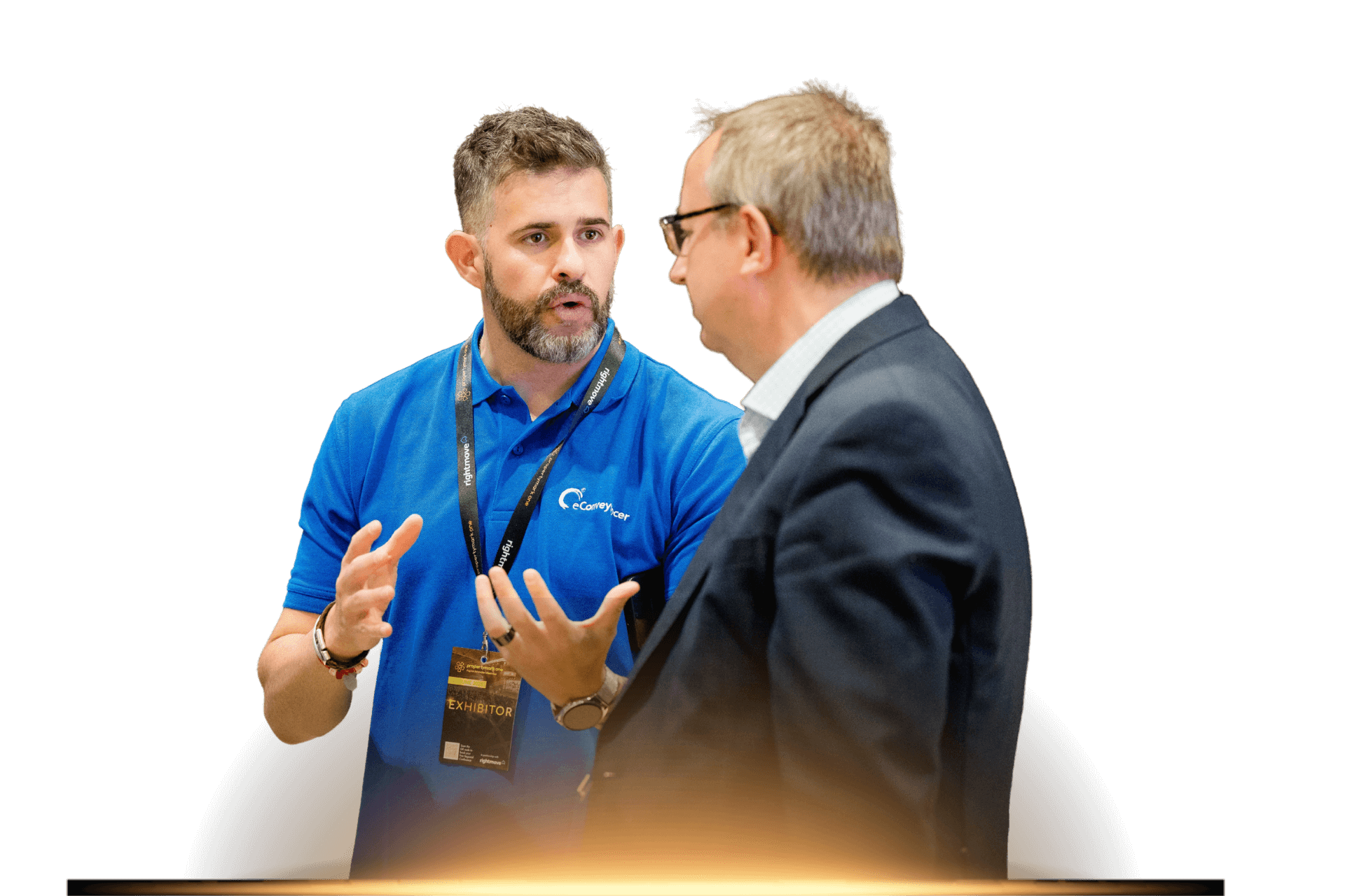 PM One exhibitor talking to delegate.png