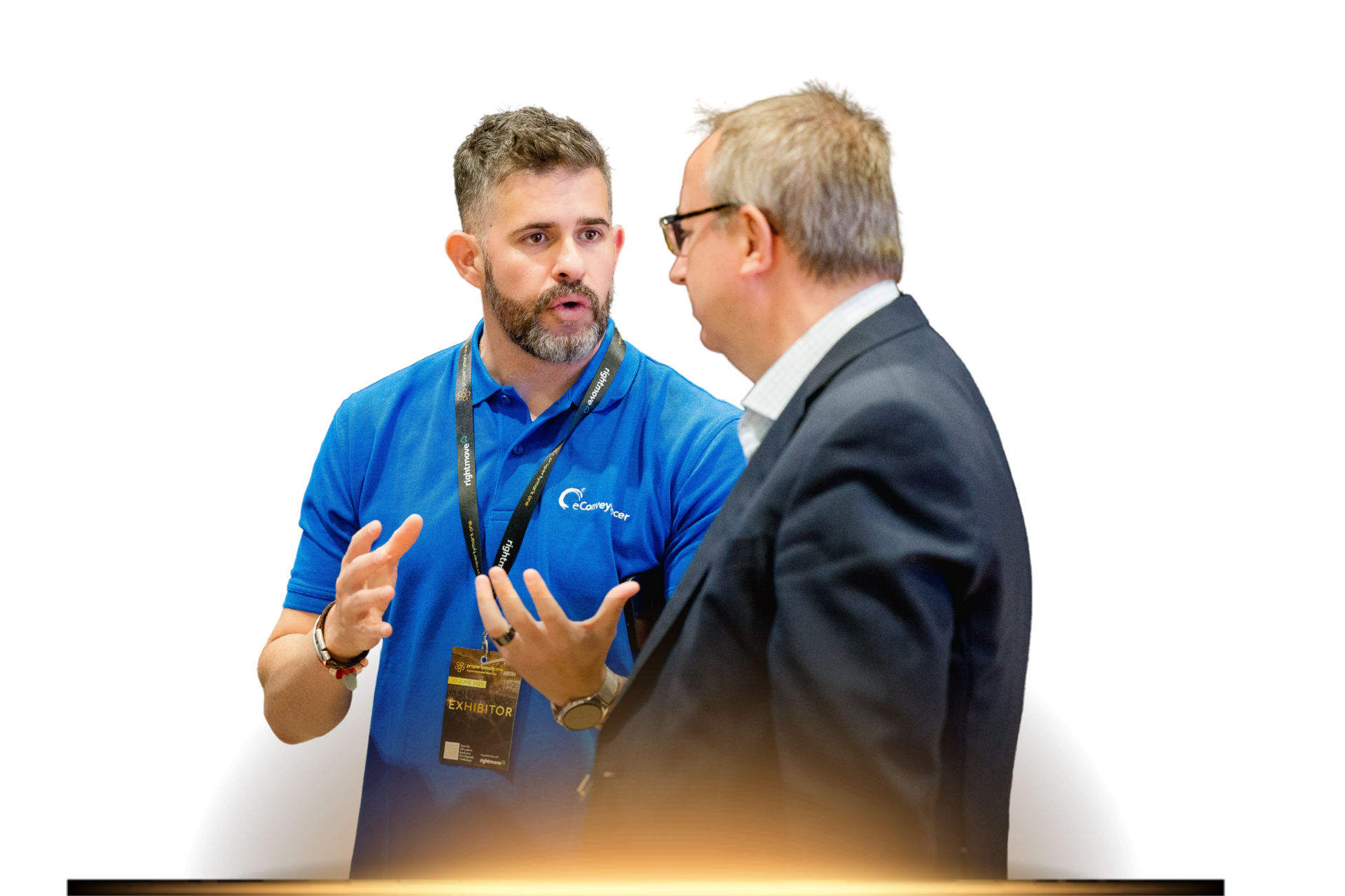 PM One exhibitor talking to delegate.png