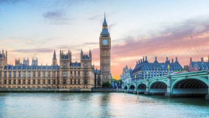 Houses of Parliament with pink sunset sky