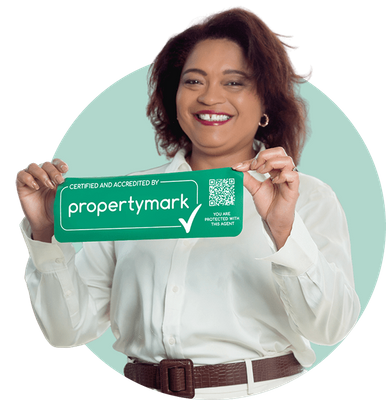 Loretta holding logo white shirt.png