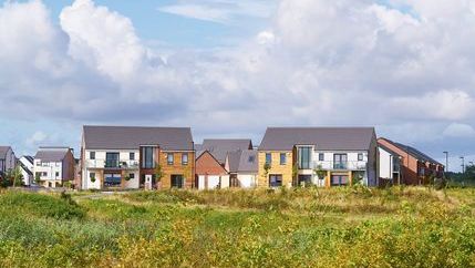 New build estate looking at houses with balconies